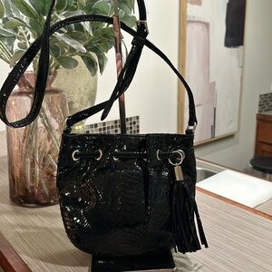 Sold Michael Kors snake print evening bag.